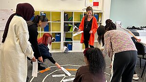 Teilnehmende des Champions of Change Programms bei einer interaktiven Übung